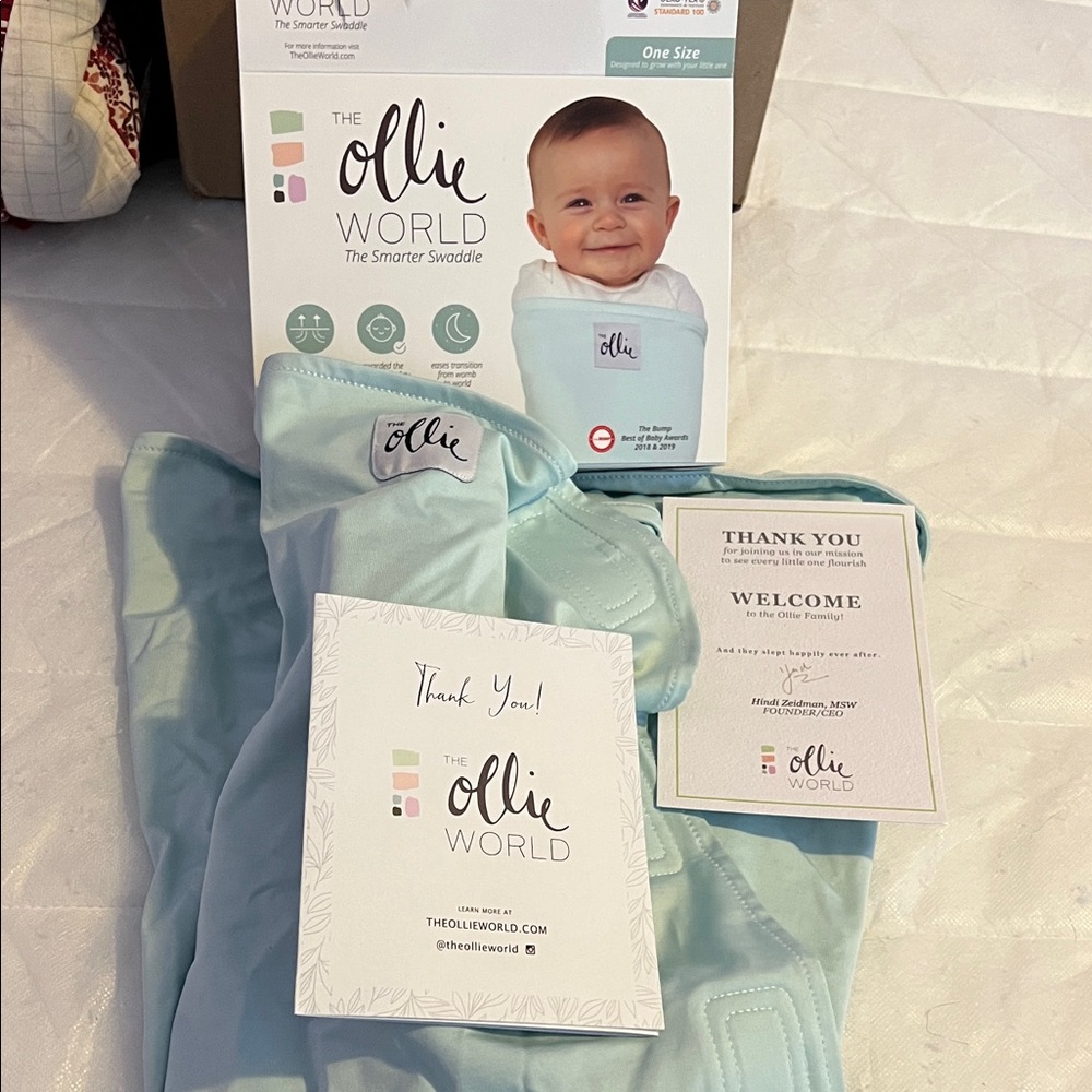 The Ollie World Baby Swaddle Sleep Sack in Light Blue